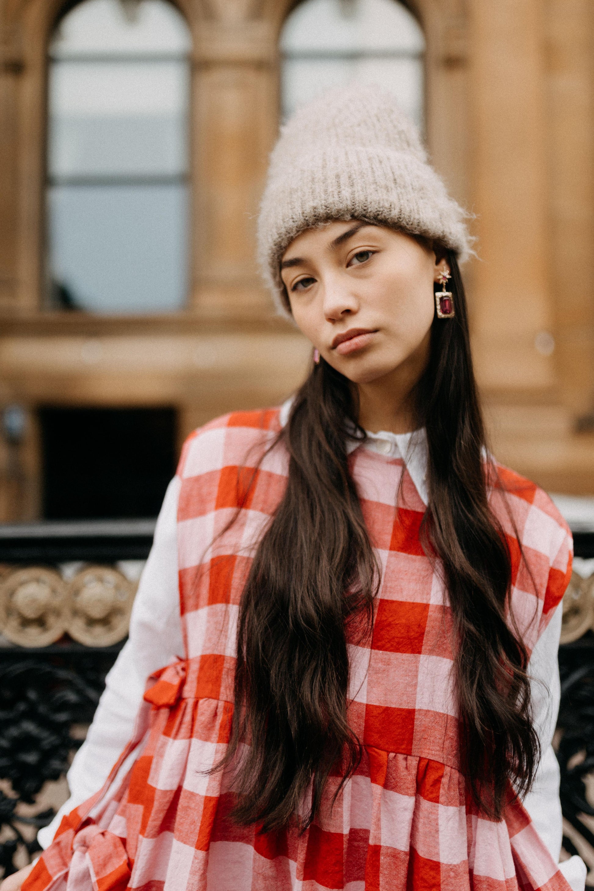 PINAFORE | PINK/RED CHECK | ONLY AVAILABLE FOR CHRISTMAS DELIVERY IF ORDERED FROM THE U.K.Our new pinafore is a really fun layering piece for the festive season. Featuring three bows on each side, she can be worn as a dress or layered over our Cadhla shir