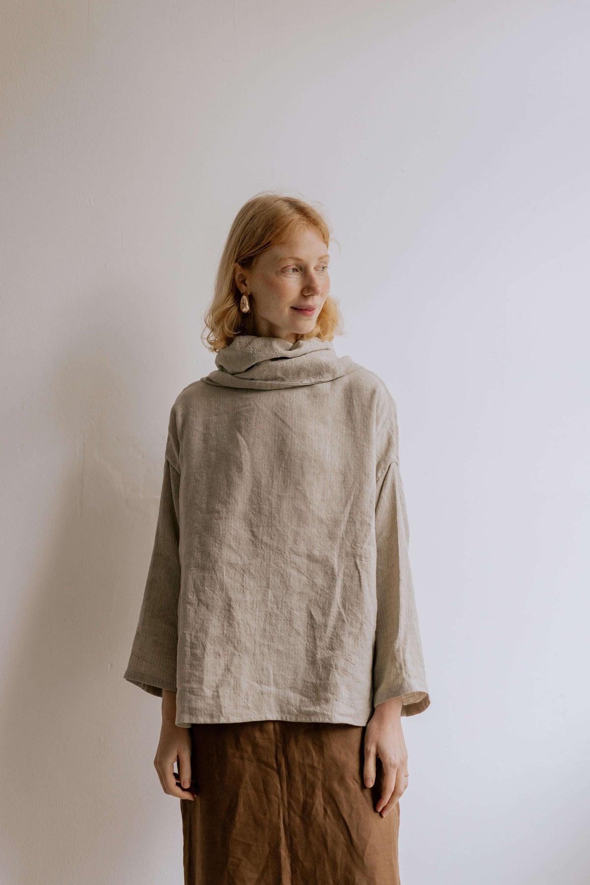 FREYA | STRIPE | Our much loved Freya Blouse in an updated brown/white stripe colour way. The shirt has an oversized collar that is secured with a tie at the back. You can play around with how the collar folds to suit your own look. In keeping with the ve