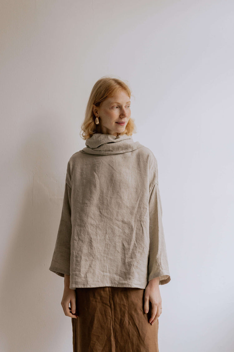 FREYA | STRIPE | Our much loved Freya Blouse in an updated brown/white stripe colour way. The shirt has an oversized collar that is secured with a tie at the back. You can play around with how the collar folds to suit your own look. In keeping with the ve