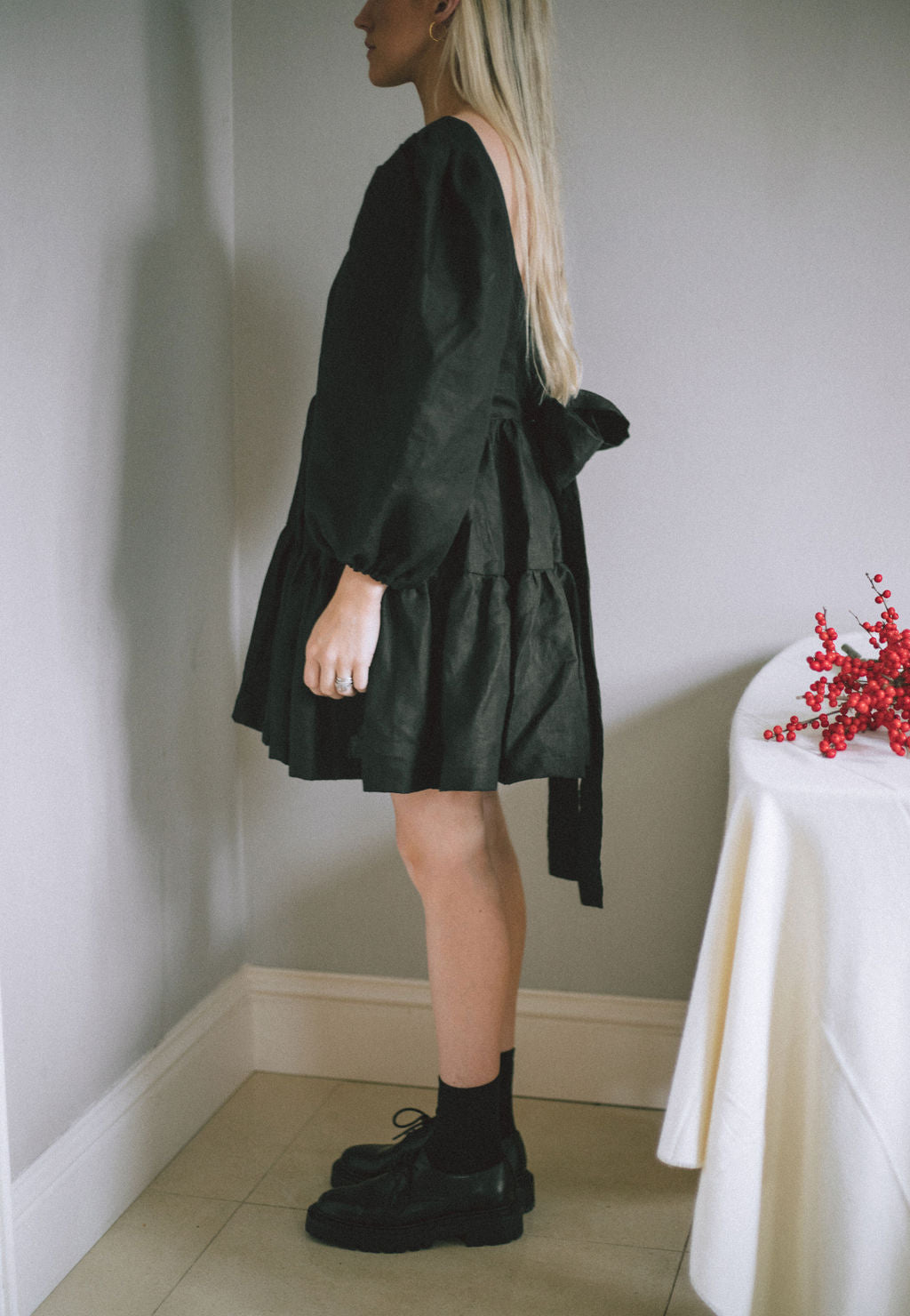 BLACK MINI BOW DRESS | Our first ever mini dress just in time for Christmas. Puff sleeves, tiered skirt and an oversized bow/low back detail. Dress up or down over the festive period and beyond. Created with black Irish linen.