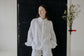 CADHLA | PEARL SET | Pajamas for the outdoors. Whether you’re lounging at home, by the pool, or nipping out for a coffee in the sunshine, our Cadhla linen loungewear set is what your wardrobe is crying out for. The Cadhla shirt can be worn on reverse with