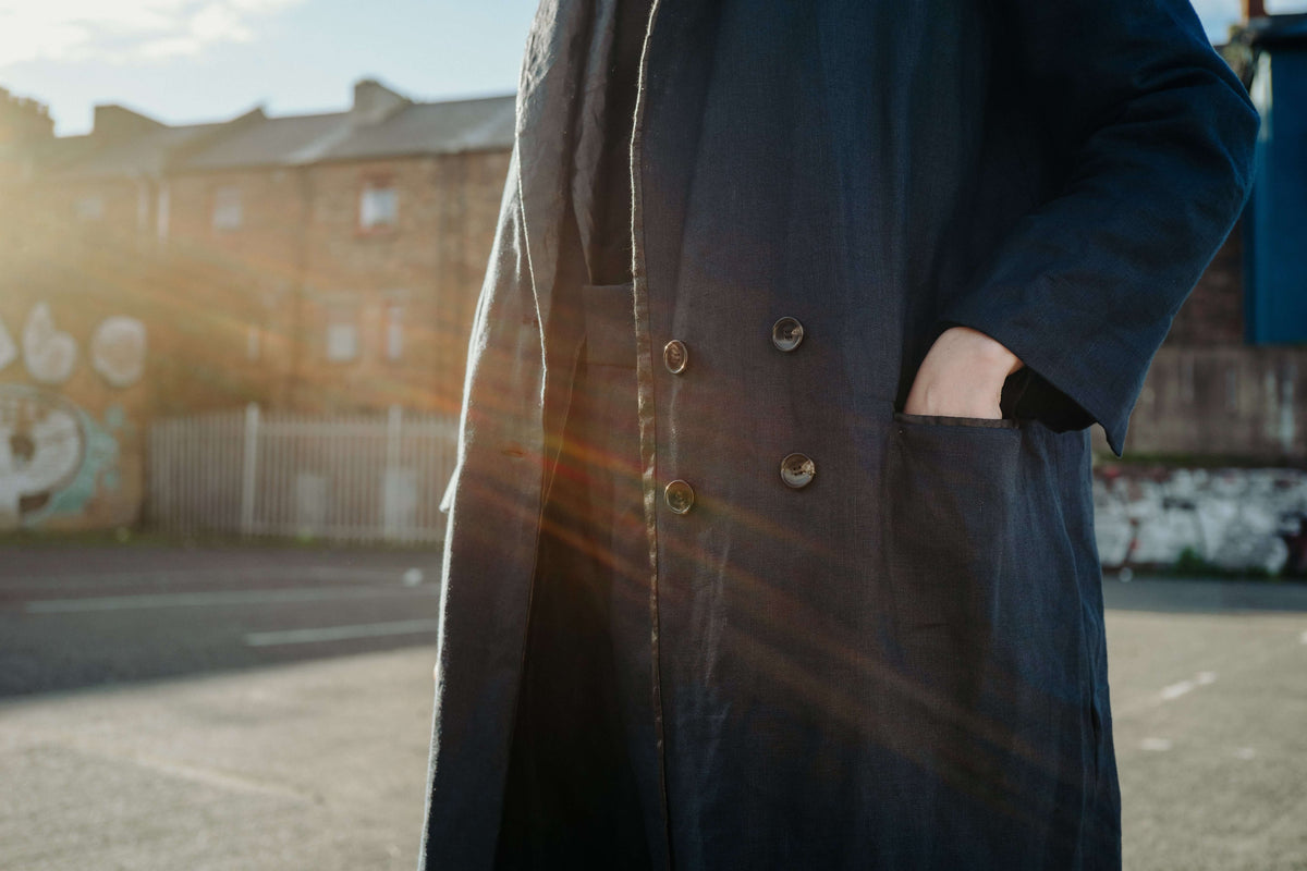NAVY | BLACK BEETLED SUIT JACKET | Our spin on the classic suit jacket. Our new suit is where structure and tailoring meet relaxed oversized fit, making it a perfect day to day throw on that is versatile enough to wear to the office as well as a festive p