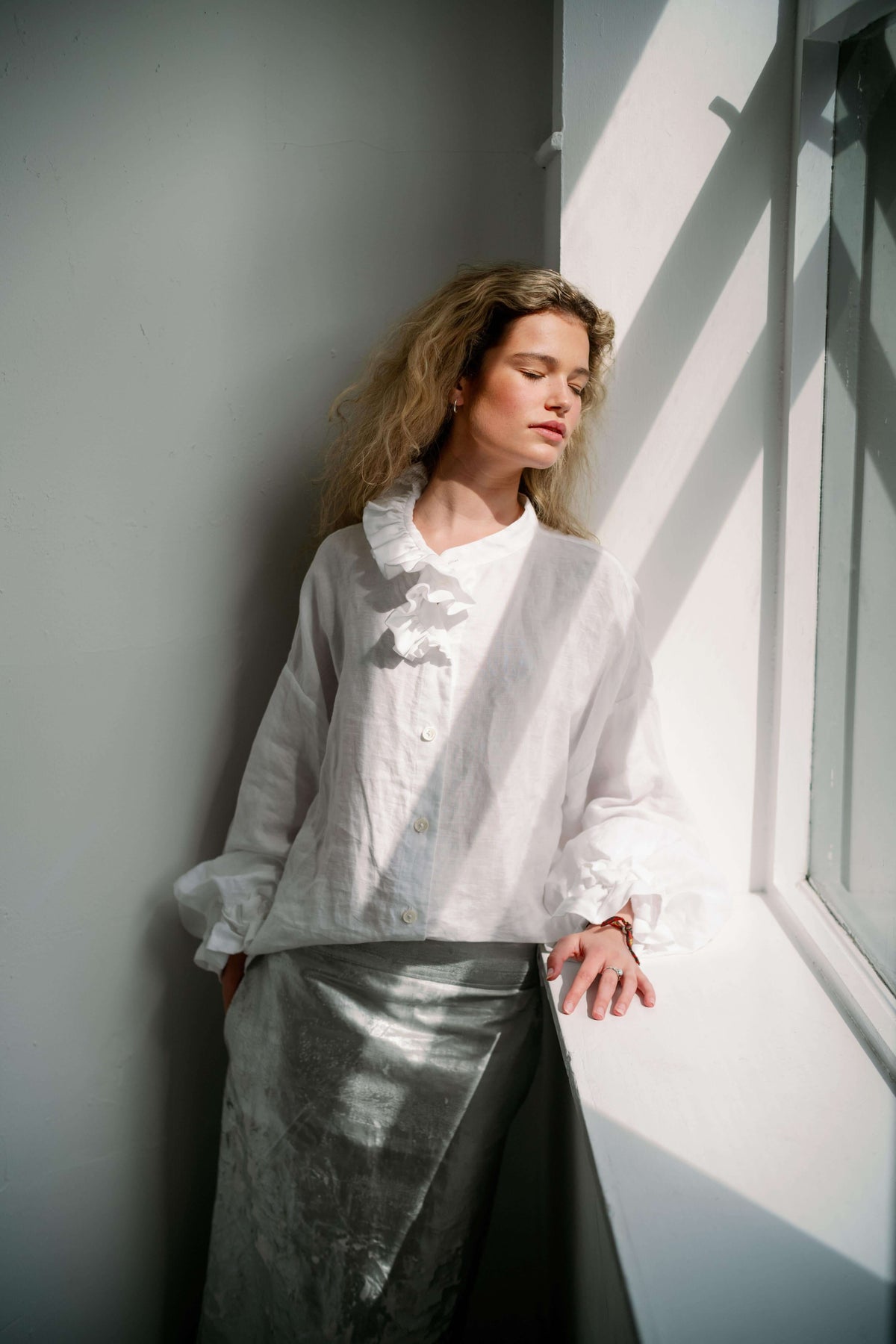 MARSHMALLOW- WHITE | An updated colourway of our favourite 'Marshmallow Blouse' for AW23- created in a luxurious white linen, this one is a play on the classic white linen shirt. Like many of our styles, this one can be worn with buttons to the front or t