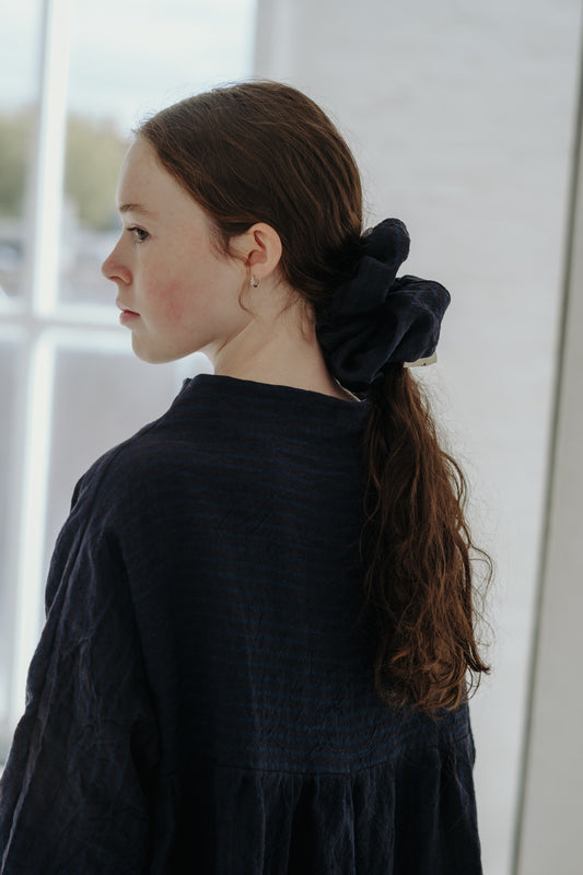 NAVY/BLACK STRIPE SCRUNCHIE | Throw your hair up in our new winter statement scrunchie. Made in a navy/black striped linen, she'll accompany just about any outfit. Your new permanent wrist companion.