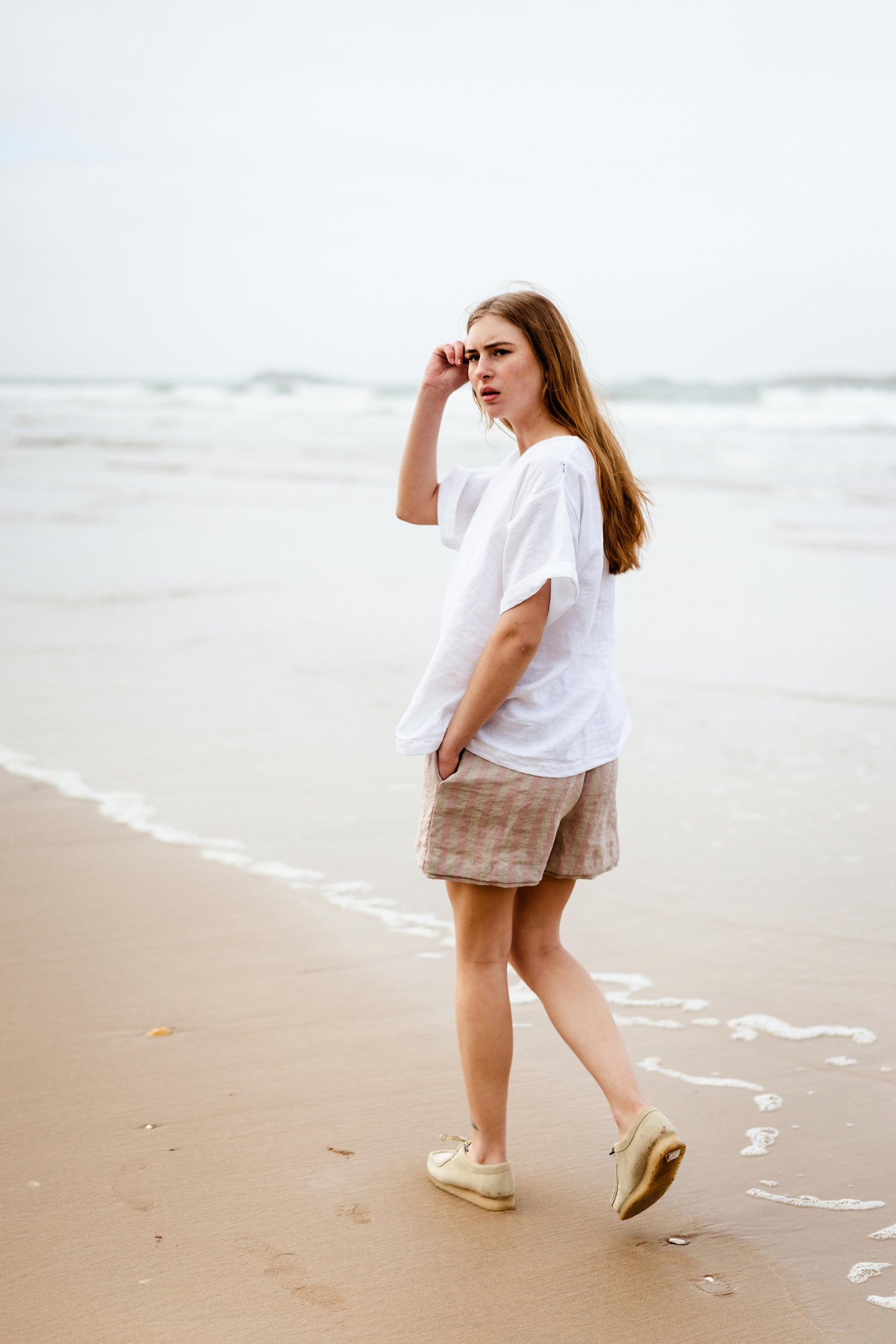 MULBERRY SHORTS | Our Mulberry shorts are a fun Summer wardrobe staple With an elasticated waist, they are easy to throw on and can be worn pulled up to waist, or worn on hips for a longer length. The shorts have side seam pockets and a double hem. Made w