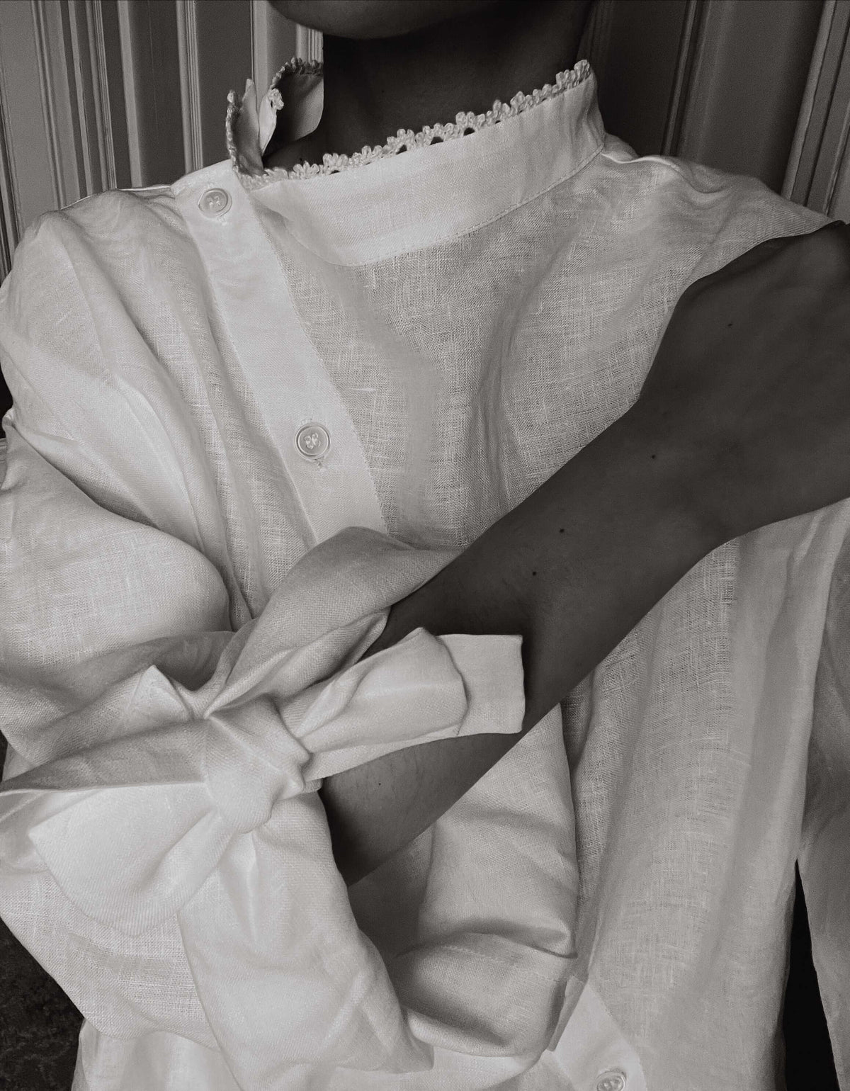 VIVIENNE | IRISH CROCHET | This is a pretty special one- the shirt you will keep forever and pass on to your kin. Created with the purest white linen, the asymetric button placket and bows on the sleeves give it a fun and modern edge, while the addition o
