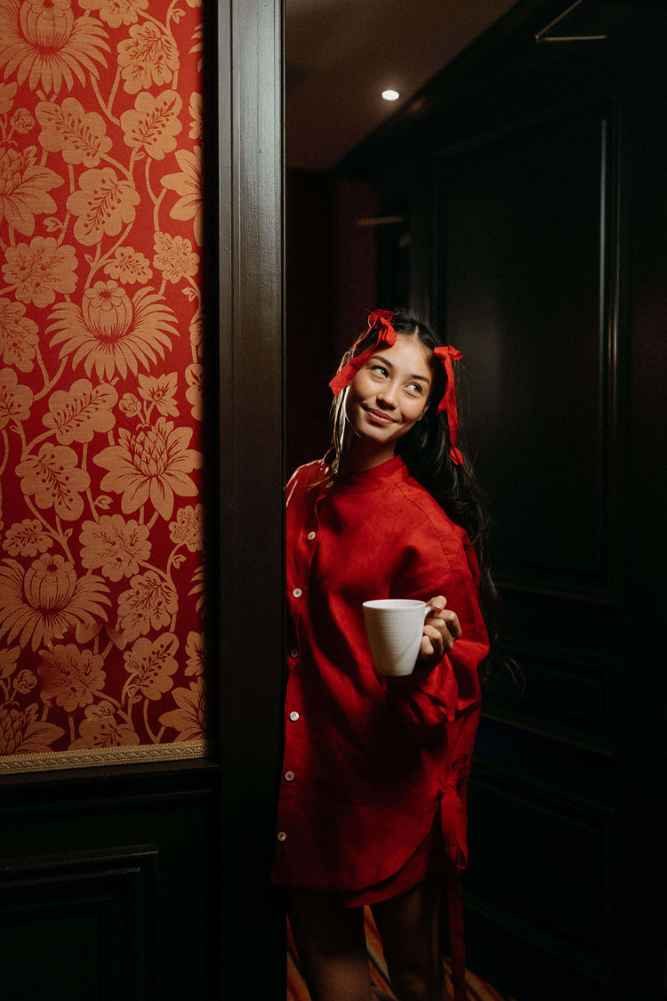 BOW SHIRT | RED | *Ready to Ship for Valentines ❤️A new special edition lounge set in our poppy red linen. The oversized shirt features a fold over detail beneath the arm which ties into a fun bow detail on either side. Wear with matching shorts, or by it