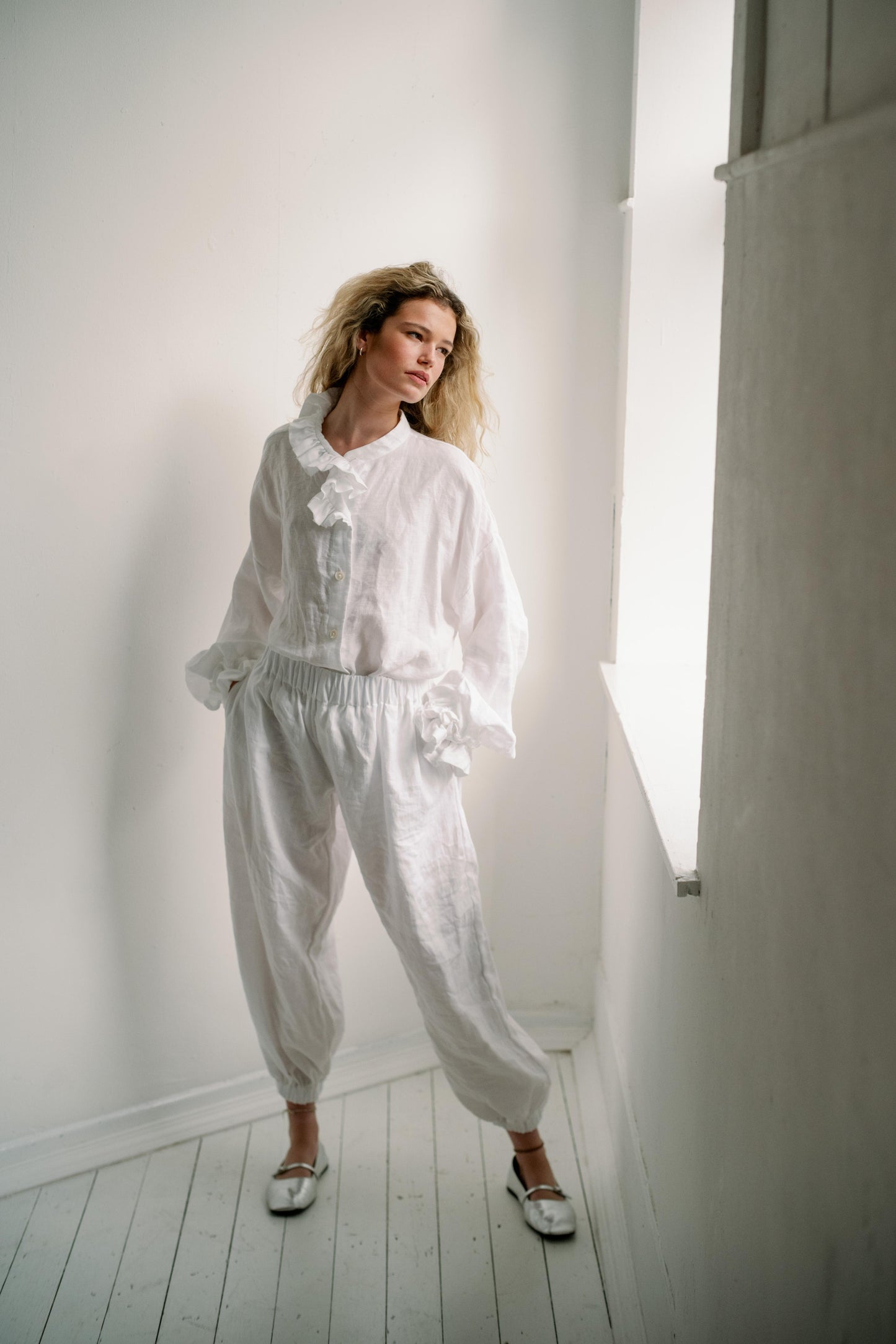 MARSHMALLOW- WHITE | An updated colourway of our favourite 'Marshmallow Blouse' for AW23- created in a luxurious white linen, this one is a play on the classic white linen shirt. Like many of our styles, this one can be worn with buttons to the front or t