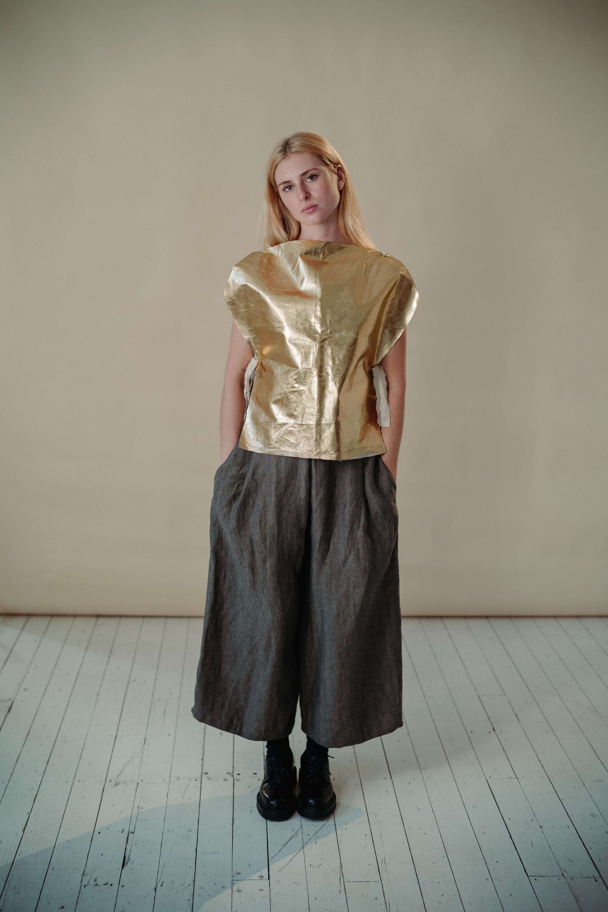 'FIND THE GOLD' VEST | Inspired by the signature golden circles of Irish artist Patrick Scott. The gold vest is the accent your staple wardrobe needs. Cut in the most simplified shape to allow the gold dry beetled linen have it's moment. Features adjustab