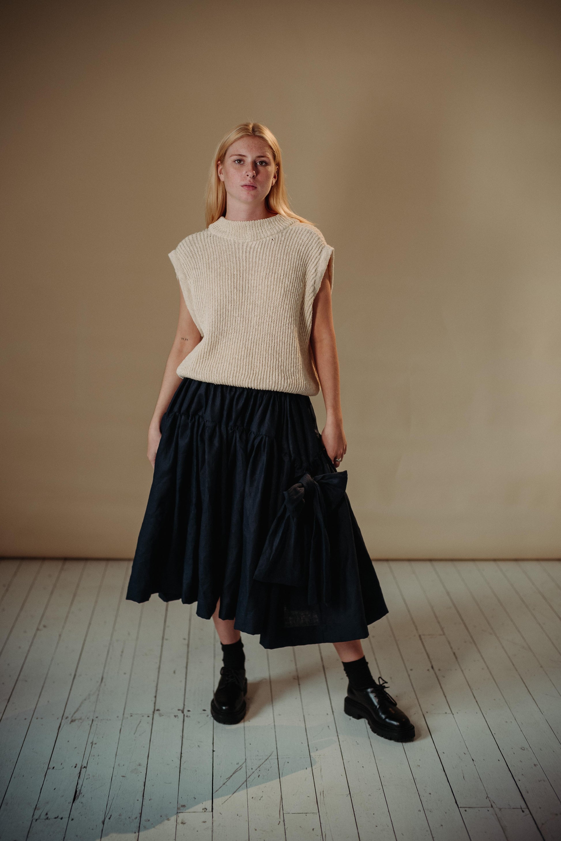 LINEN TUTU | The linen tutu - because no one ever really grows up enough to not want to wear a tutu! Voluminous, romantic and feminine, the tutu features two gathered layers with an oversized bow in a luxurious dark navy. Side seam pockets. Made with 100%