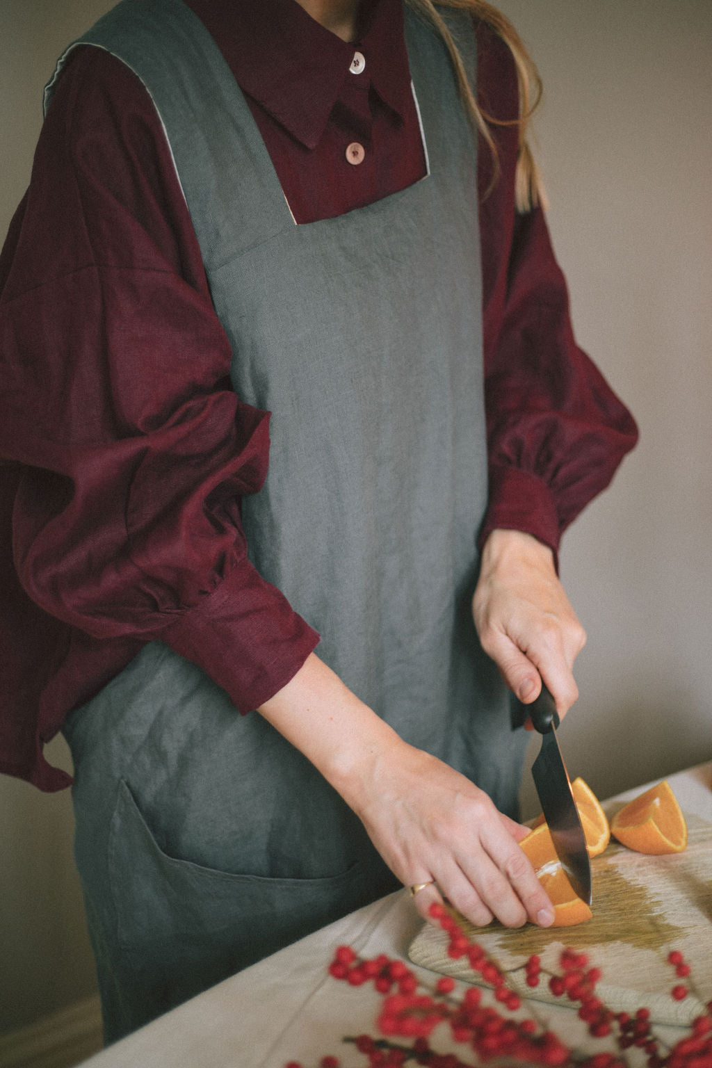 REVERSIBLE LINEN APRON | One of the most beautiful things about Christmas is the preparation of food, setting the table, pulling out all the stops for our friends and family at such a special time of year. We created this reversible cross - over apron to