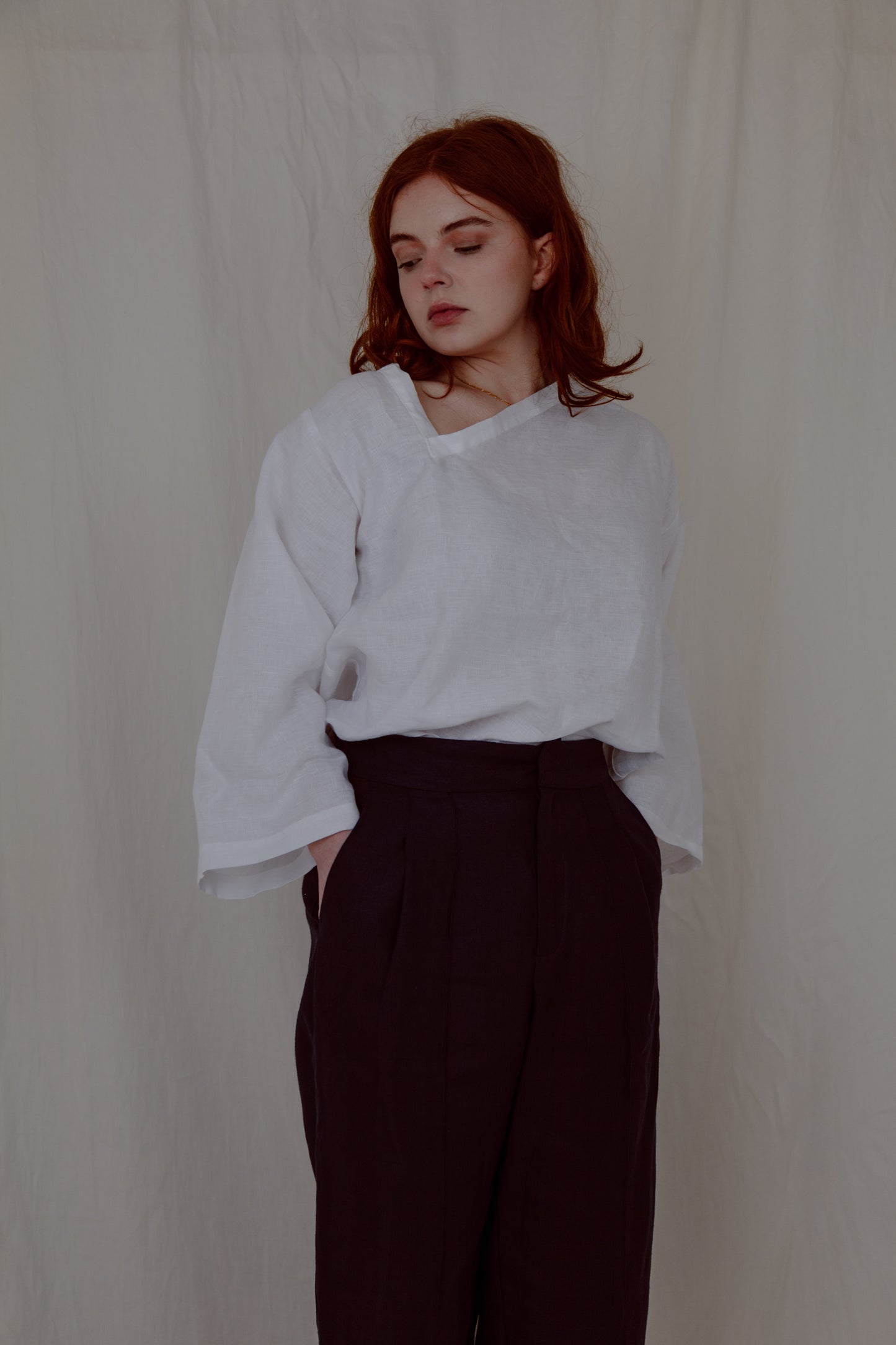 ASYMMETRIC TEE | An update on our best selling staple- the kind tee. This one features a flattering assymetric neckline detail that makes it a little more special than your average white tee, yet really wearable and easy to dress up or down. Wear with our