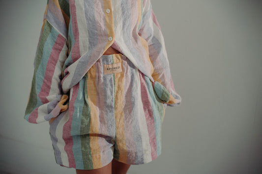 DOVE CADHLA SHORTS | Add a subtle spash of colour to your Summer wardrobe. The Dove shorts are created with our custom rainbow stripe Irish linen. The shorts are comfortable and flattering making them an easy to wear summer staple. An elasticated waistban