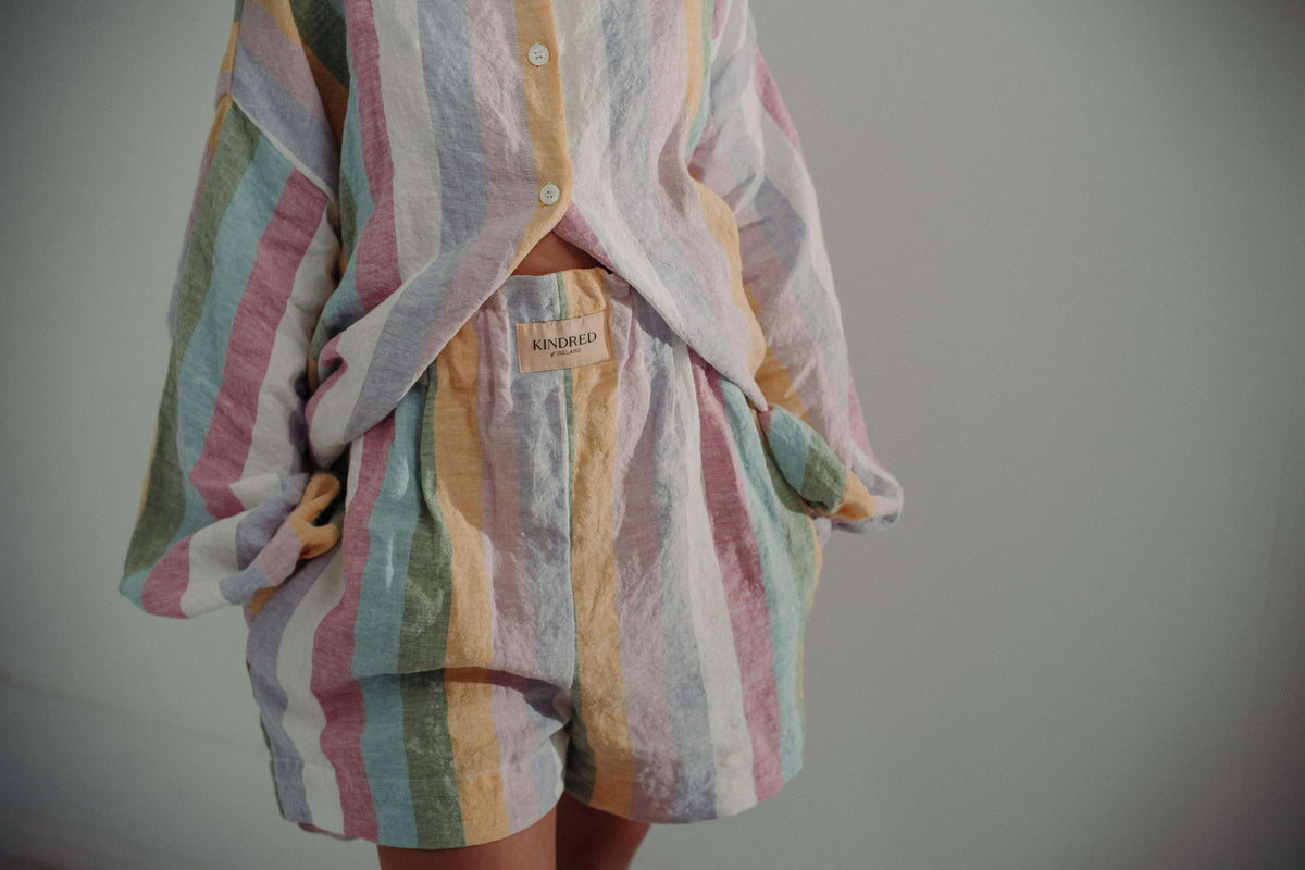 DOVE CADHLA SHORTS | Add a subtle spash of colour to your Summer wardrobe. The Dove shorts are created with our custom rainbow stripe Irish linen. The shorts are comfortable and flattering making them an easy to wear summer staple. An elasticated waistban
