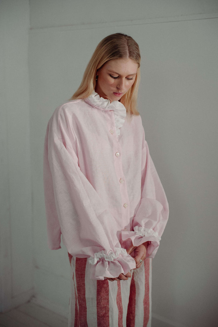 MARSHMALLOW BLOUSE | The Marshmallow Blouse is a fun interpretation of a favourite summer memory of toasting marshallows round the fire on the beach. The shirt features an assymetric frill detail on the collar - one side has structured white frills and th