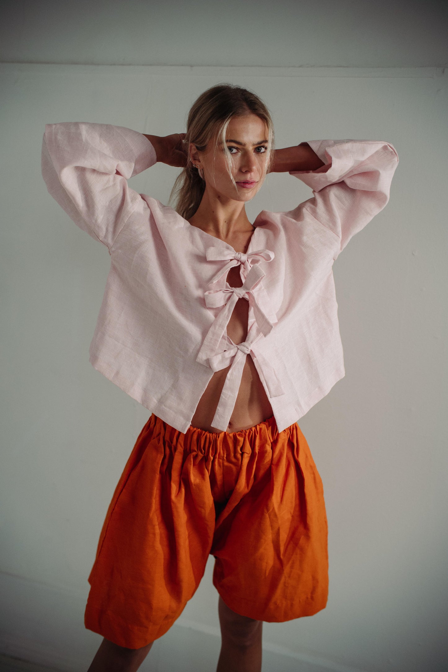 SOLERO SHORTS | Baggy, oversized shorts with an elasticated waistband. Created with bright orange linen, these shorts are a statement yet so comfortable and wearable.