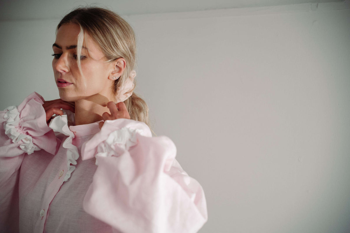 MARSHMALLOW BLOUSE | The Marshmallow Blouse is a fun interpretation of a favourite summer memory of toasting marshallows round the fire on the beach. The shirt features an assymetric frill detail on the collar - one side has structured white frills and th