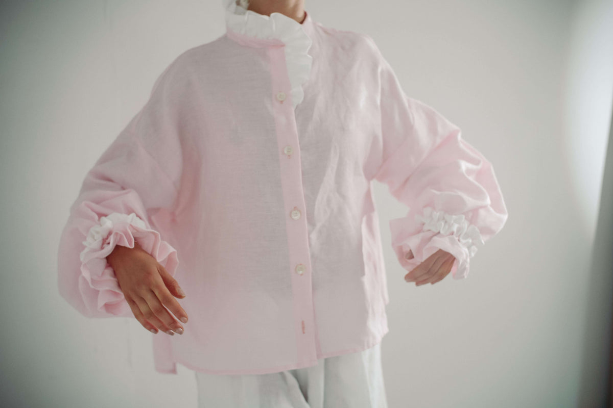 MARSHMALLOW BLOUSE | The Marshmallow Blouse is a fun interpretation of a favourite summer memory of toasting marshallows round the fire on the beach. The shirt features an assymetric frill detail on the collar - one side has structured white frills and th