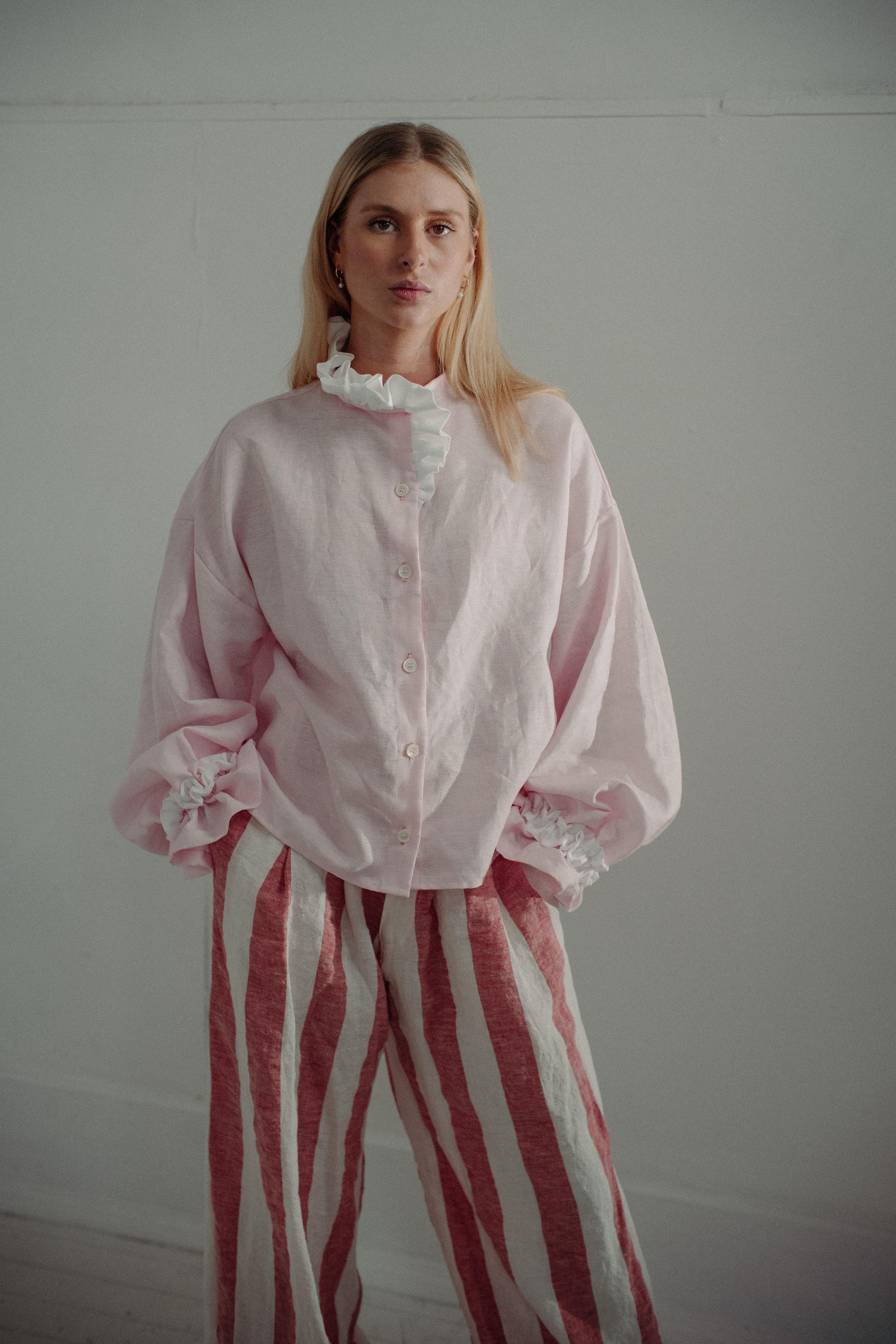 MARSHMALLOW BLOUSE | The Marshmallow Blouse is a fun interpretation of a favourite summer memory of toasting marshallows round the fire on the beach. The shirt features an assymetric frill detail on the collar - one side has structured white frills and th