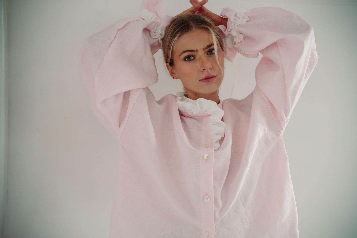 MARSHMALLOW BLOUSE | The Marshmallow Blouse is a fun interpretation of a favourite summer memory of toasting marshallows round the fire on the beach. The shirt features an assymetric frill detail on the collar - one side has structured white frills and th