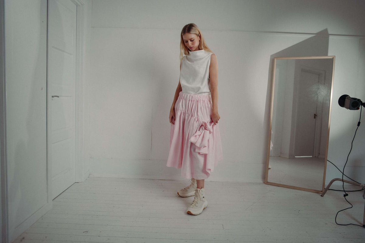 PINK TUTU | The linen tutu, now in the most whimsical, pretty pink - because no one ever really grows up enough to not want to wear a tutu! Voluminous, romantic and feminine, the tutu features two gathered layers with an oversized bow in a luxurious dark